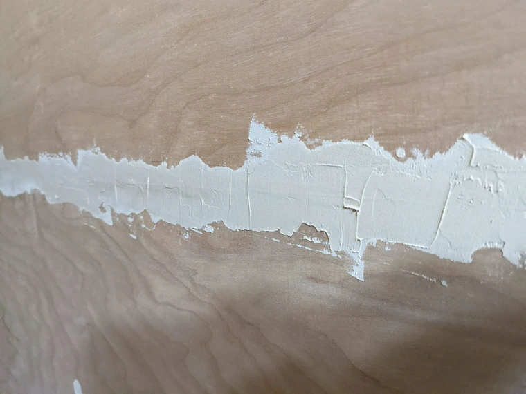 Applying more wood filler